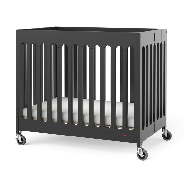 Rolling mini cheap crib